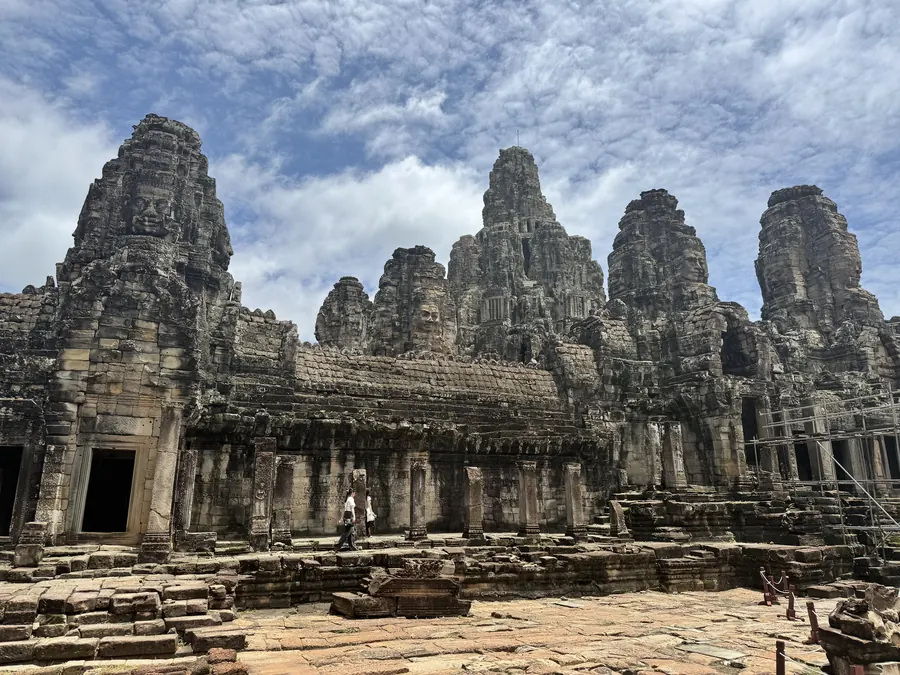 The Bayon face towers — part of the big Angkor circuit, confirmed by Dylan